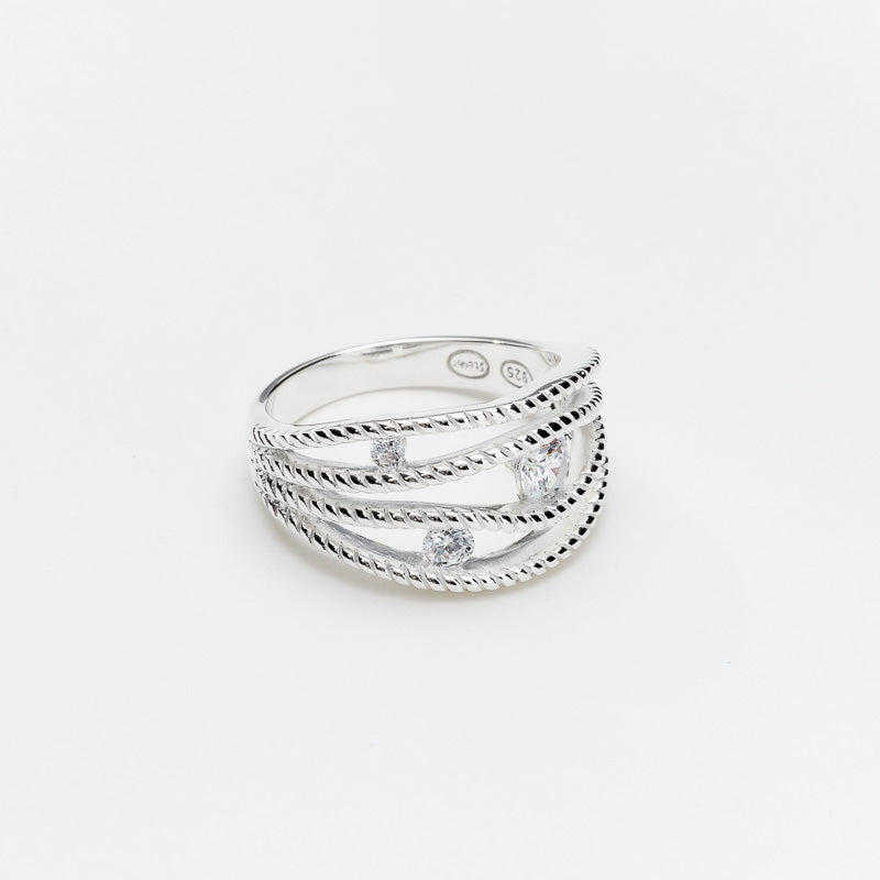 Bague argent FORMÉE DE 4 ANNEAUX GRAVÉS ET ESPACÉS DÉCORÉS DE 3 pierres CANYON