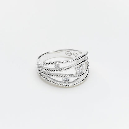 Bague argent FORMÉE DE 4 ANNEAUX GRAVÉS ET ESPACÉS DÉCORÉS DE 3 pierres CANYON